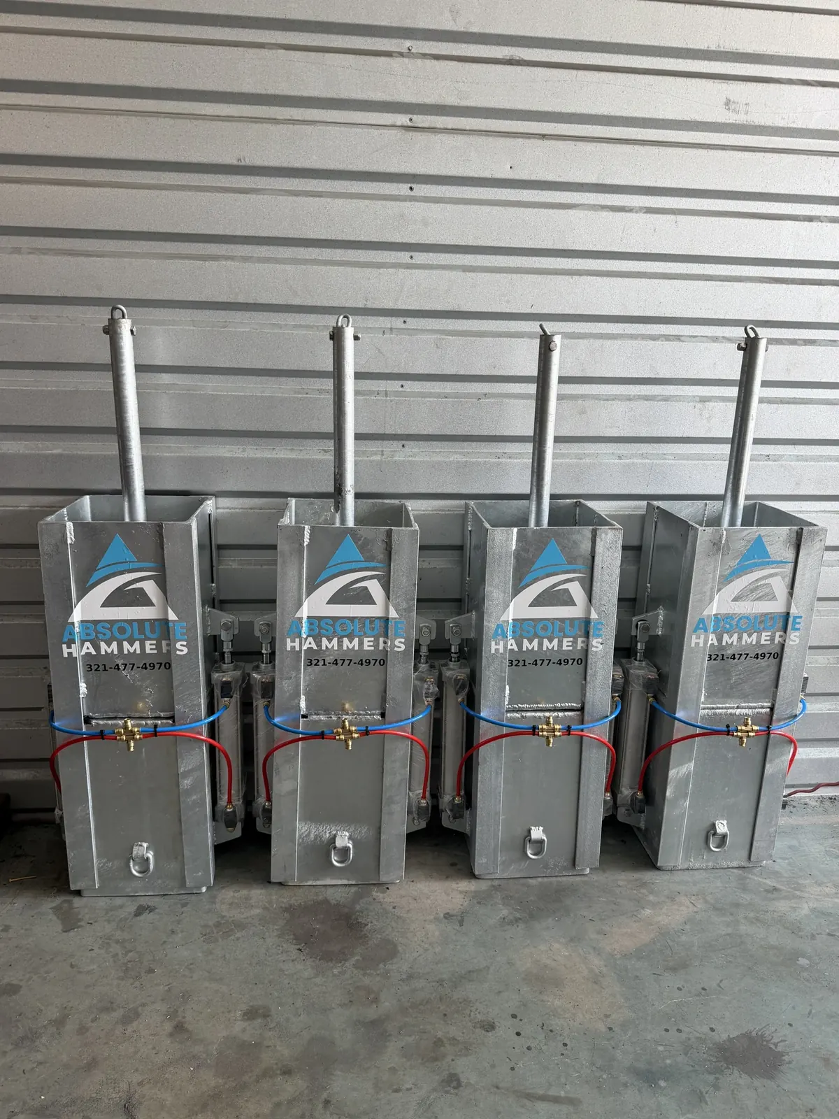 Row of hammers at an angle showing the pneumatic hardware