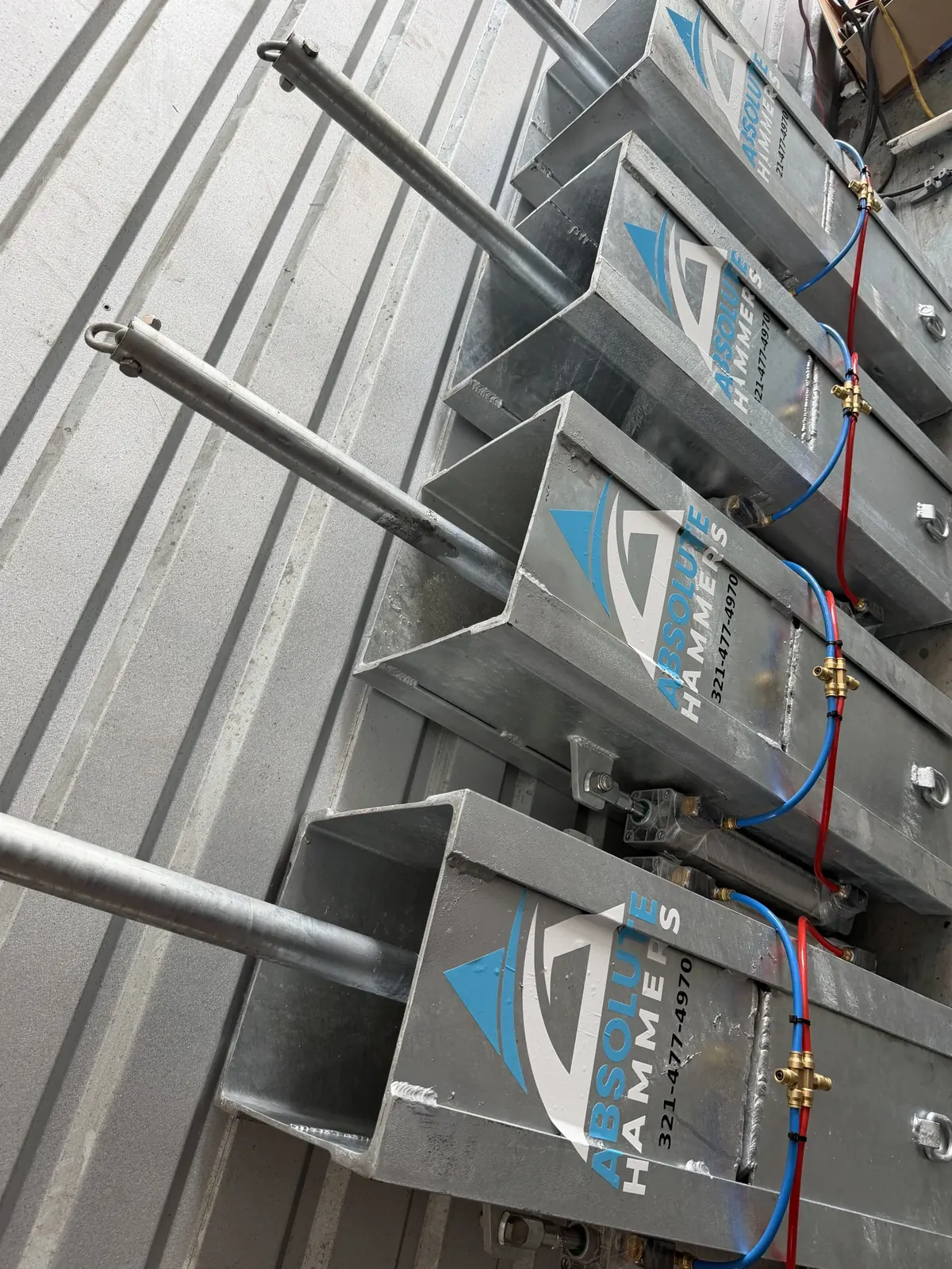 Four Absolute Hammers lined up in the shop